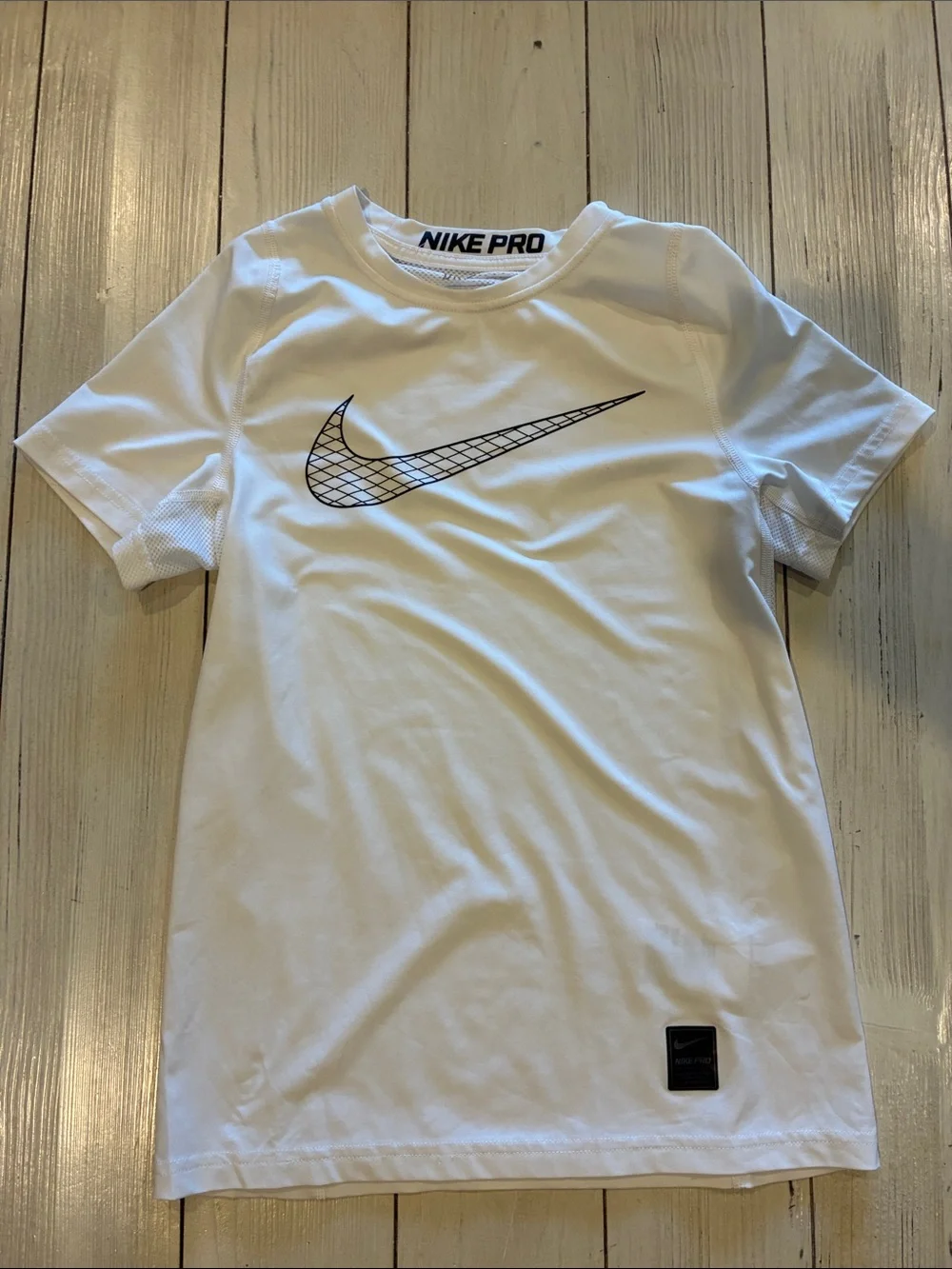 Nike White Short-Sleeve Dri-FIT Training Tee with Black Swoosh